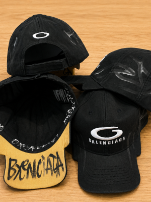 Black Balenciaga Y2K distinctive notched visor cap