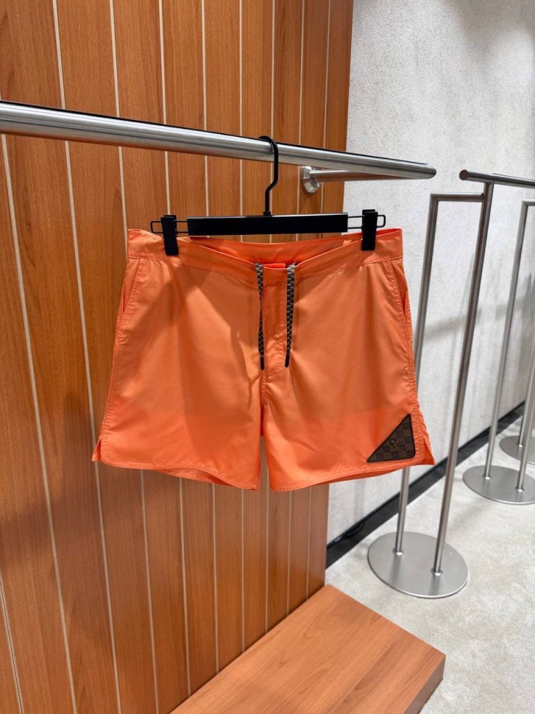 Orange LV damier heritage patch signature swim shorts