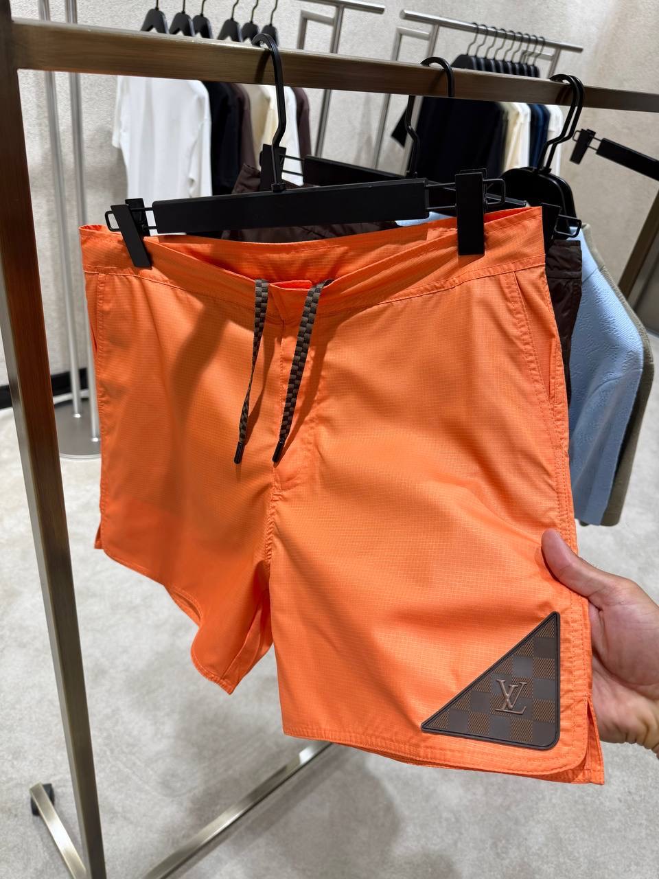 Orange LV damier heritage patch signature swim shorts - Image 3